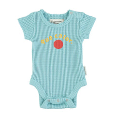 PIUPIUCHICK LIGHT BLUE W/ "QUE CALOR" PRINT ROMPER